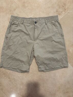 INFINITY Light Olive Flat-Front Performance Shorts - Size 34